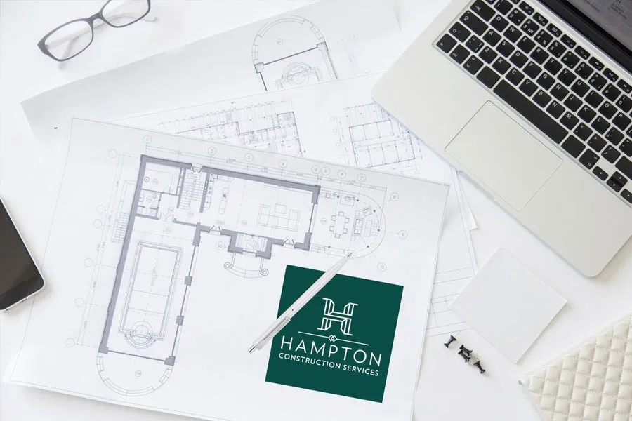 plans-on-table-with-hampton-logo